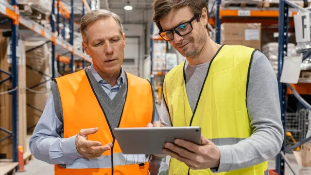 Operations manager reviewing KPIs on a tablet